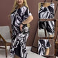 🌸 Rochie vaporoasă elegantă cu gât rotund imprimat